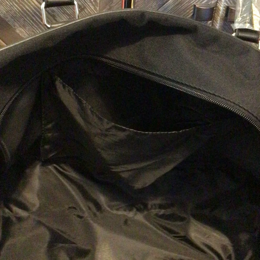 New Calvin Klein Elegant Black canvas and leather Duffel Bag